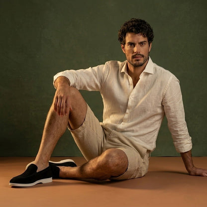 Anzio Loafer Black, worn with linen, seated
