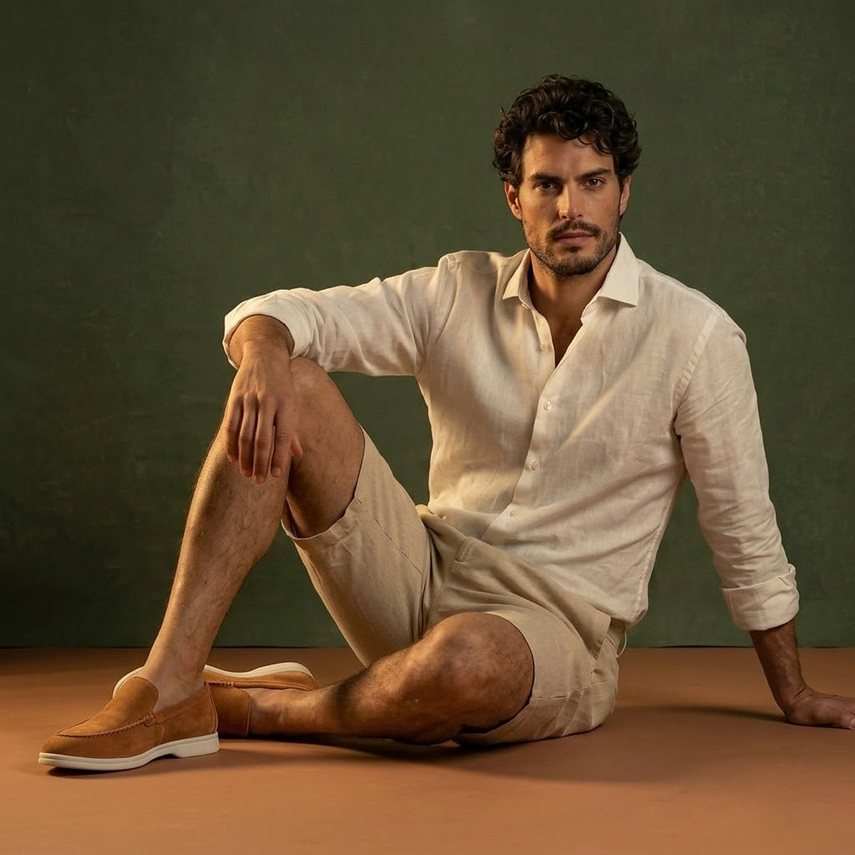 Anzio Loafer Caramel, worn with linen, seated