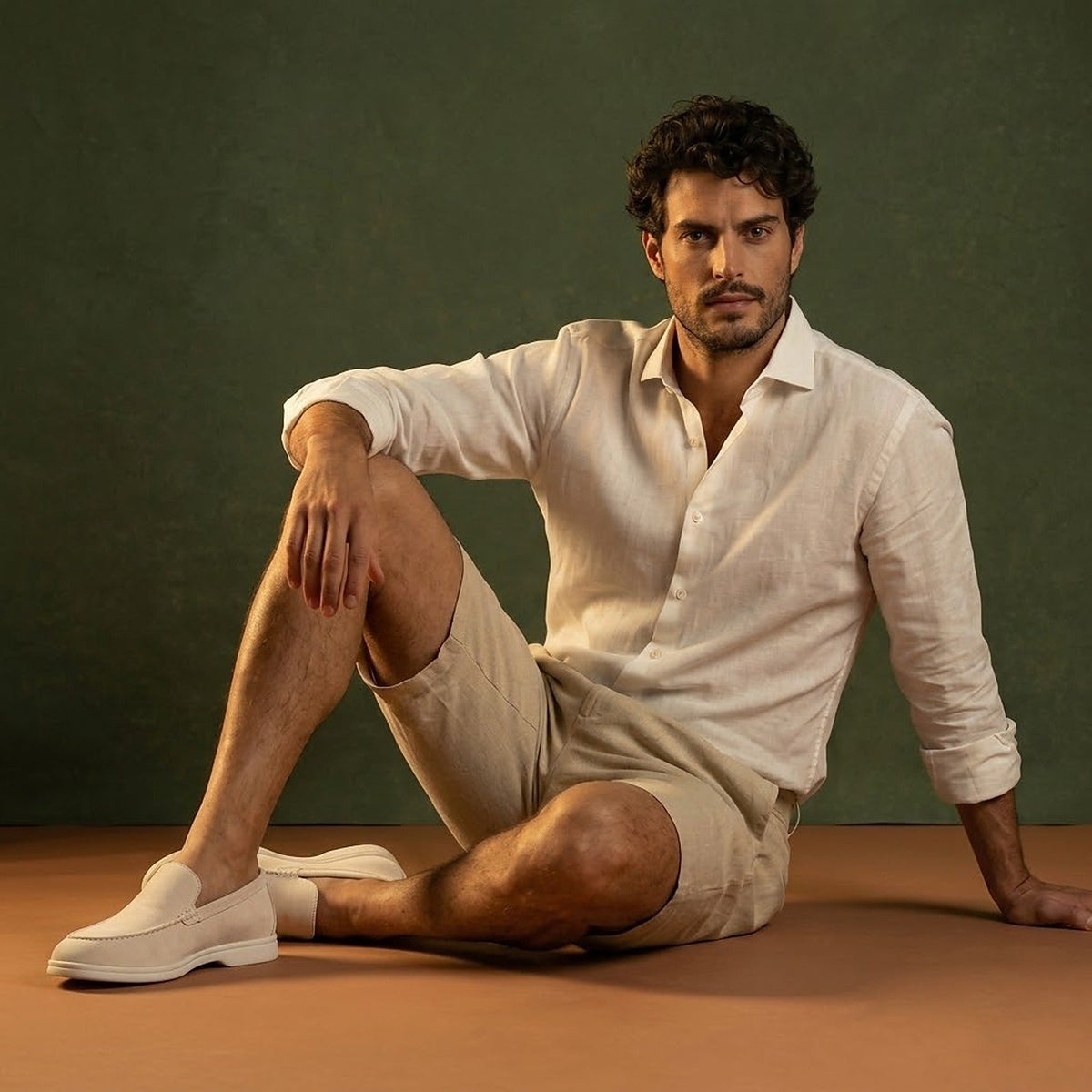 Anzio Loafer Ivory, worn with linen, seated