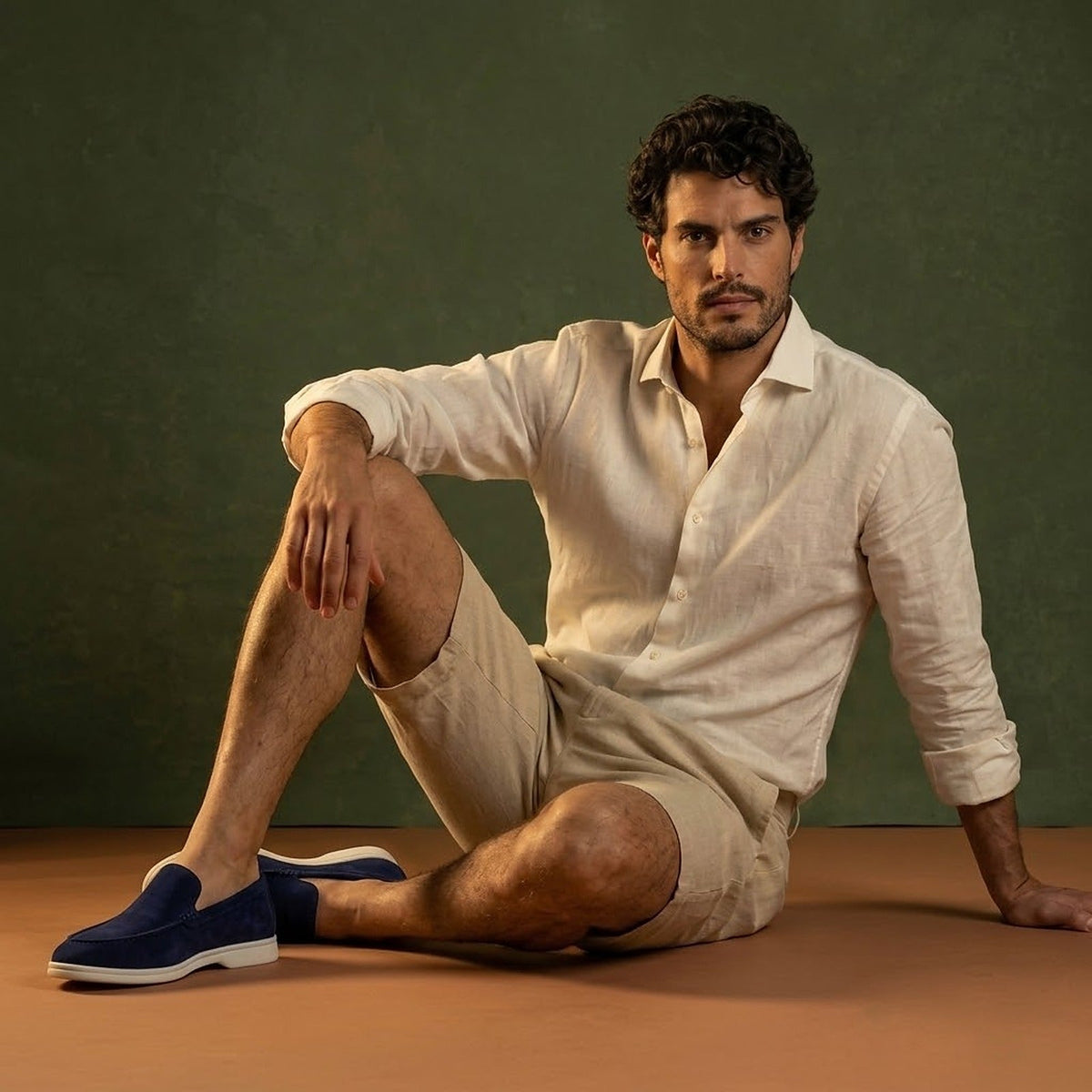 Anzio Loafer Navy, worn with linen, seated